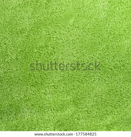a sage green square background of warm, cozy micro-fleece blanket fabric