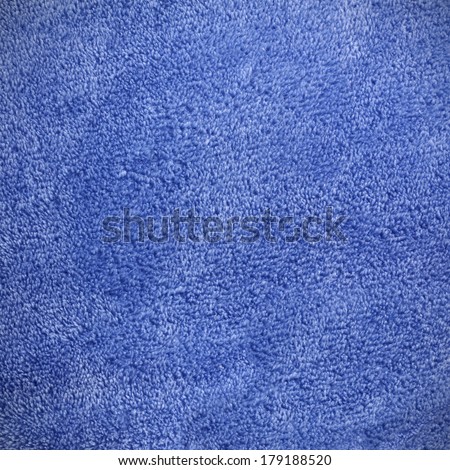 a square royal blue background of soft, cozy micro fleece fabric blanket