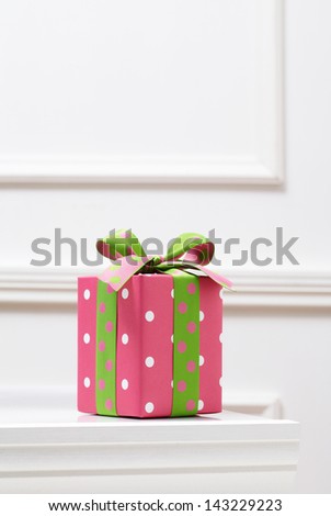 pink gift box on white table. Gift boxes.