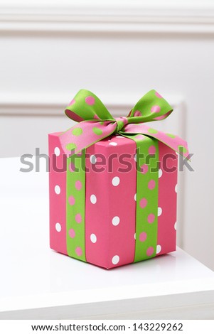 pink gift box on white table. Gift boxes.