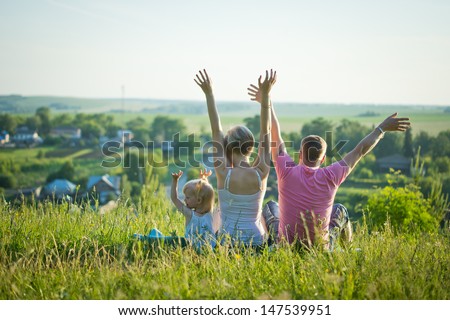happy family in nature enjoy the freedom