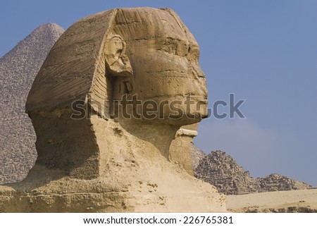 The Sphinx with the Great Pyramid in the background, Giza, Egypt.