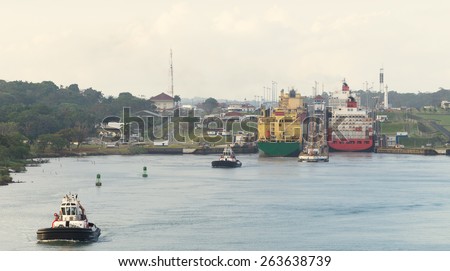 Two large ships wait to transit the Miraflores locks in the Panama Canal, just outside Panama City.