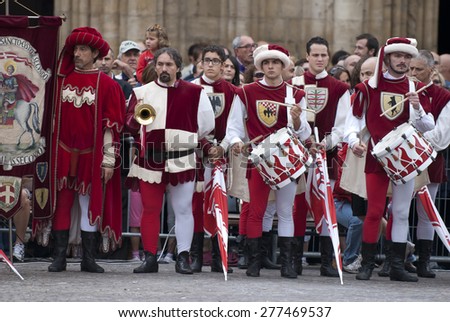 Asti, Italy - September 19, 2010: the historic Medieval parade of the Palio of Asti in Piedmont, Italy. Street performers in medieval costumes parading in the Palio of Asti.