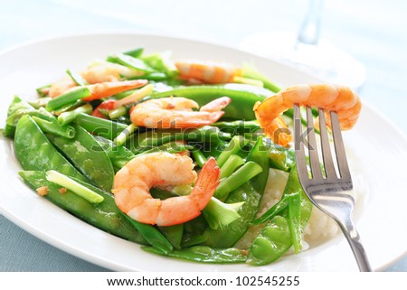 Salt and pepper shrimp with snow peas