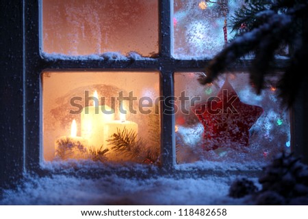Frosted window with Christmas decoration
