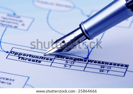 analyzing business flow chart,pen showing \