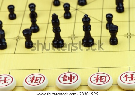 Western Chess Playing with Chinese Chess