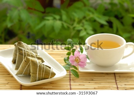 Chinese Traditional Food and Drink--Rice dumpling(zongzi) and herbal tea.