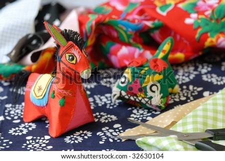 View of Chinese Traditional Cloth-Art --Donkey and Tiger.