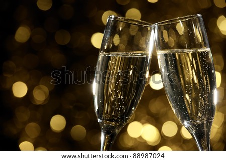 Flutes of champagne in holiday setting,Closeup...