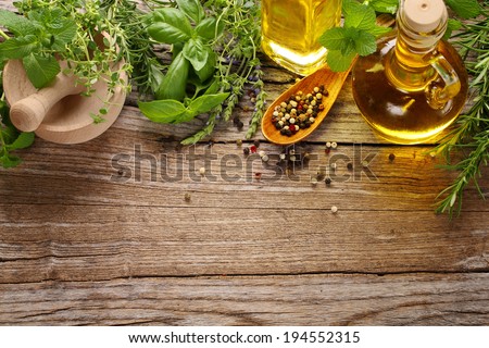 herbs,spice and oil on wooden table