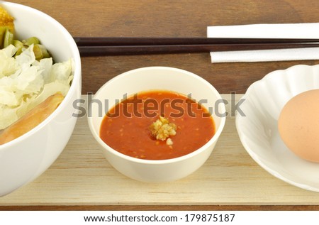 Suki set serve with egg and spicy suki sauce.Asian food style.