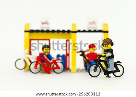 Orvieto, Italy - February 22th 2015: Lego men write on bike shop. Lego is a popular line of construction toys manufactured by the Lego Group