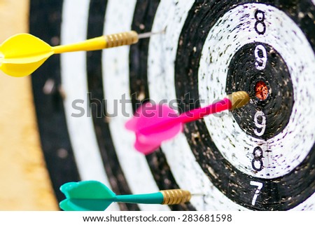 Old target of darts. Get a bull's eye. Focus on center of target.