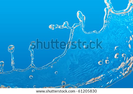 pouring fresh tropical blue sea water in a glass aquarium