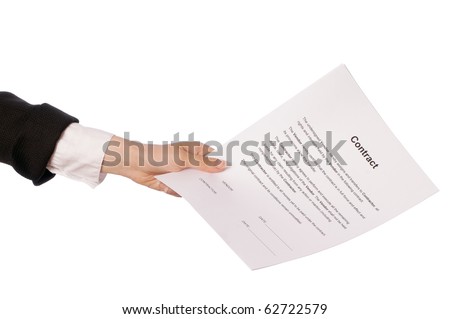 The managing director giving her partner a contract for signing