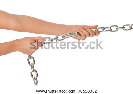 Woman pulling a long heavy metal chain