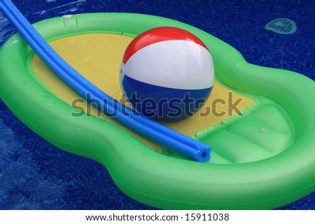 Inflatable Pool Toys containing mattress, beach ball, and floaty