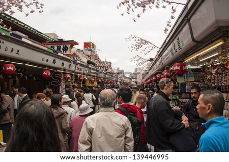 TOKYO, JAPAN - APR 20 :  Nakamise Shopping Street Asakusa on April 20, 2012 in Tokyo, Japan. It is lined by more than 50 shops, which offer local specialties and tourist souvenirs.