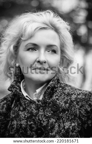 Portrait of a beautiful middle aged woman, black and white