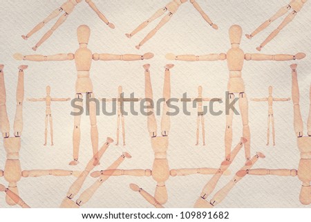 Designed paper texture background with wooden dummies motifs