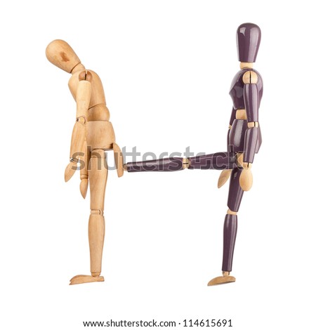 One wooden dummy kicking another isolated on a white background