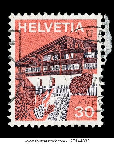 SWITZERLAND - CIRCA 1973: a stamp printed in the Switzerland shows Village in Simme Valley, Switzerland, circa 1973