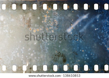 Blank grained moldy film strip texture background