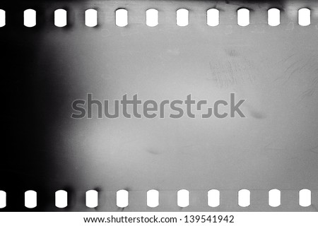 Blank grained film strip texture background