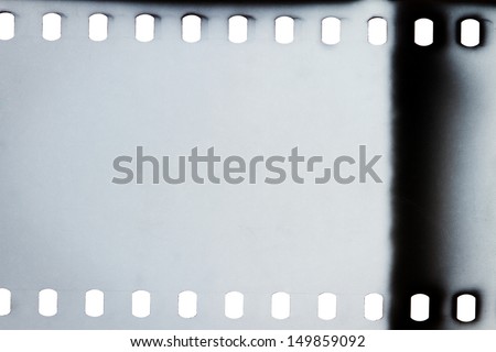 Blank grained film strip texture background