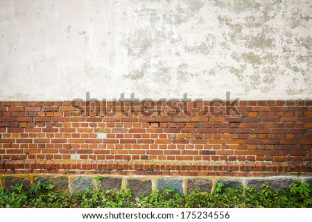 Red and white wall background with stone basement