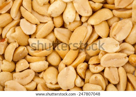 Salted roasted peanuts texture background