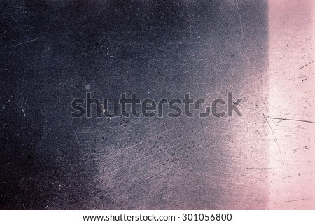 Blank grained film strip texture background with heavy grain, dust, scratches and light leak