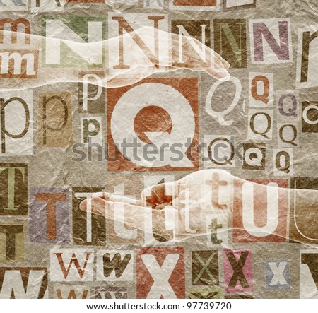 Abstract designed background made of newspaper letters clippings, hands and paper texture