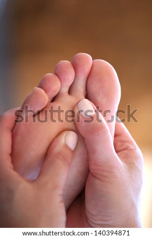 Foot Massage in a Woman Feet
