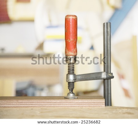 stock photo : Gluing some wood together