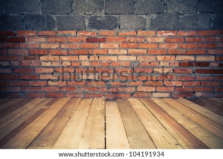 background of grungy brick wall and old wooden floor