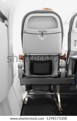 airline passenger seat, rear view