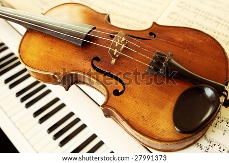 violin and piano keys