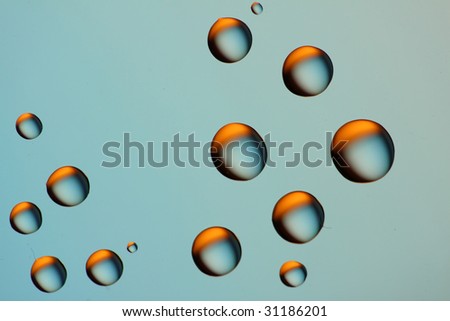 blue drops with orange reflection