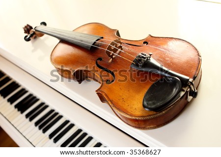 violin and piano keys