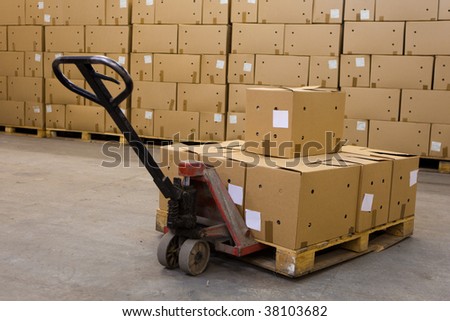 boxes on hand pallet truck