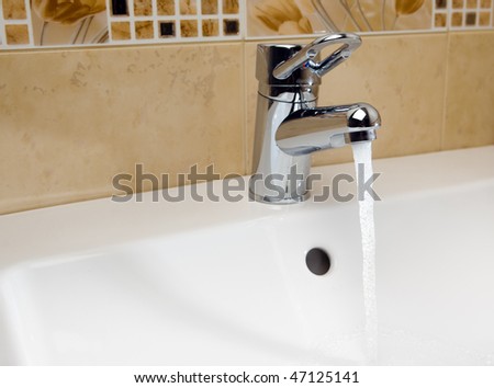 mixer tap with running water
