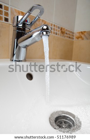 mixer tap with running water