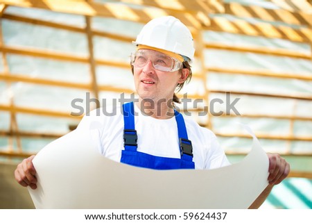 builder manager looking at the construction project