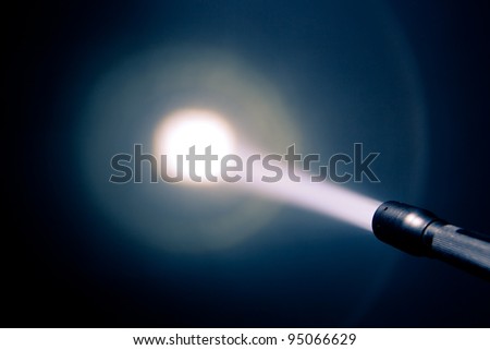 focused glowing pocket torch light