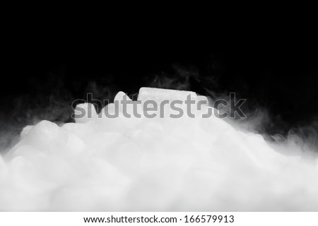 dry ice with vapor on black