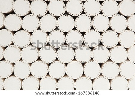 abstract background of white filters of cigarettes, closeup view