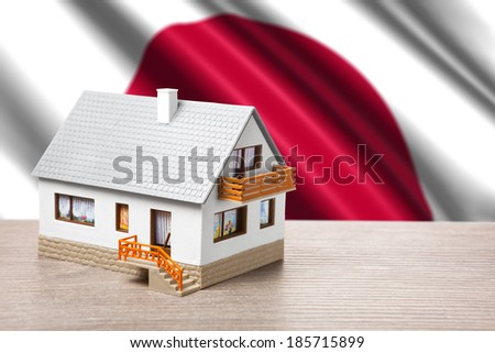 classic house against Japanese flag background